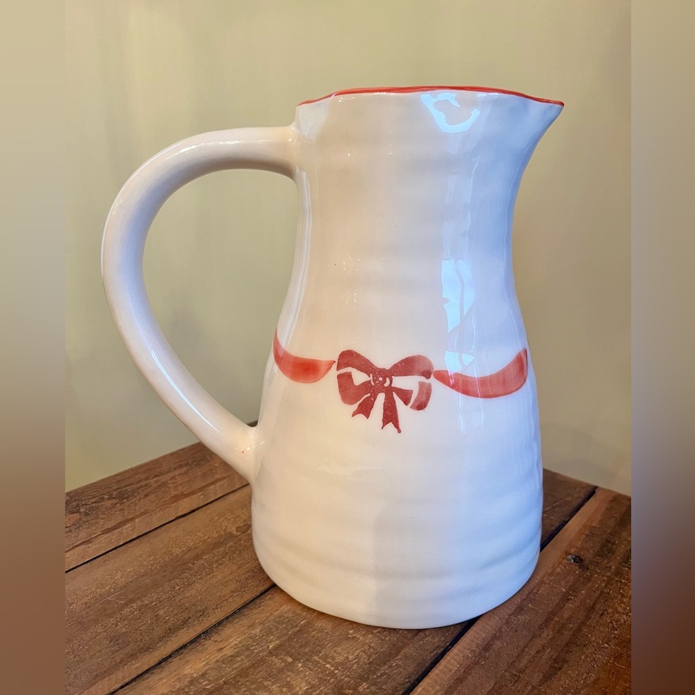 White Ceramic pitcher with bow design
